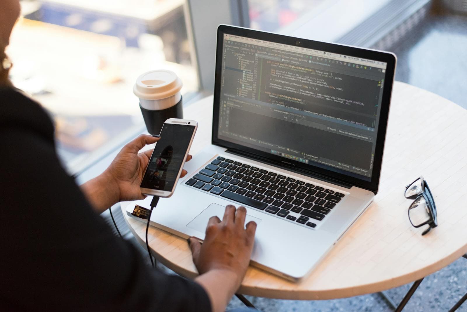 Developer working on software representing operational transformation at Meridian Logistics