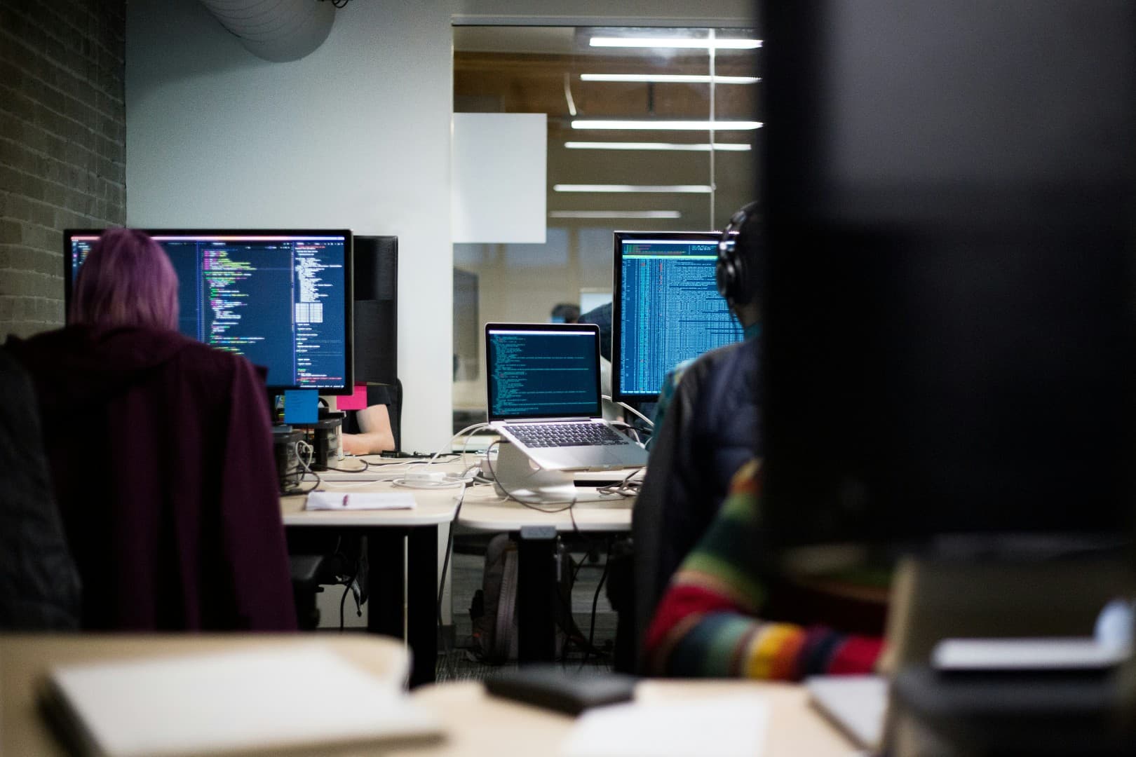 AI and automation development workstation with multiple monitors