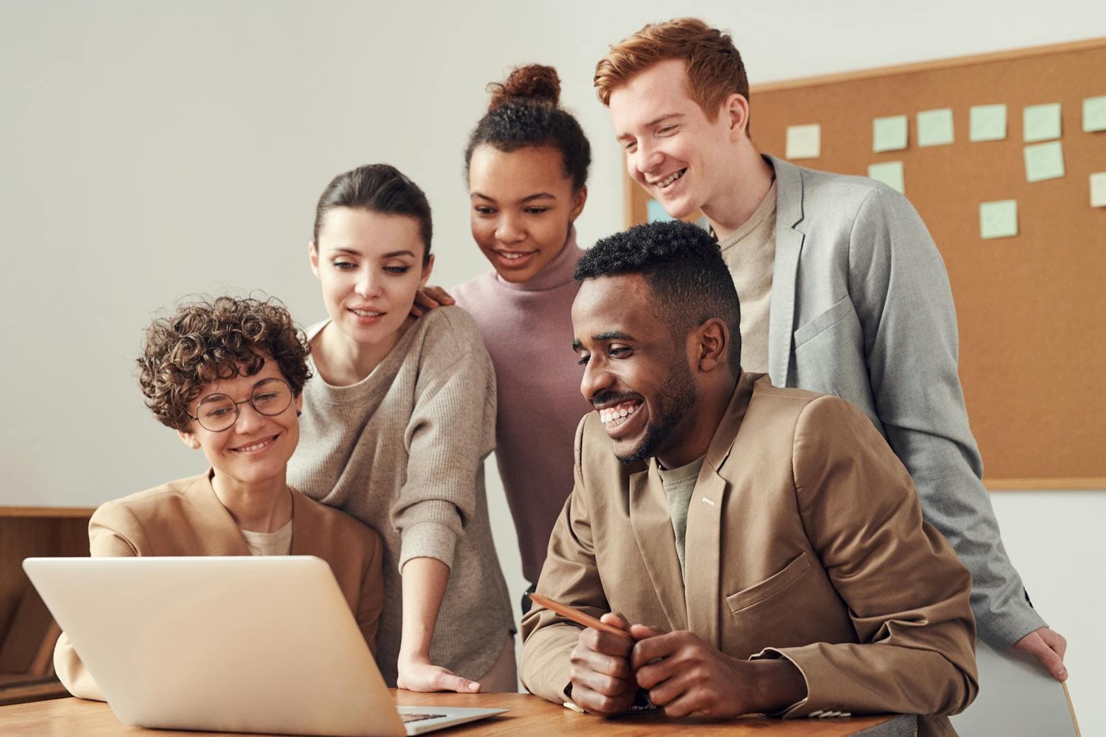 Diverse team executing project deliverables together