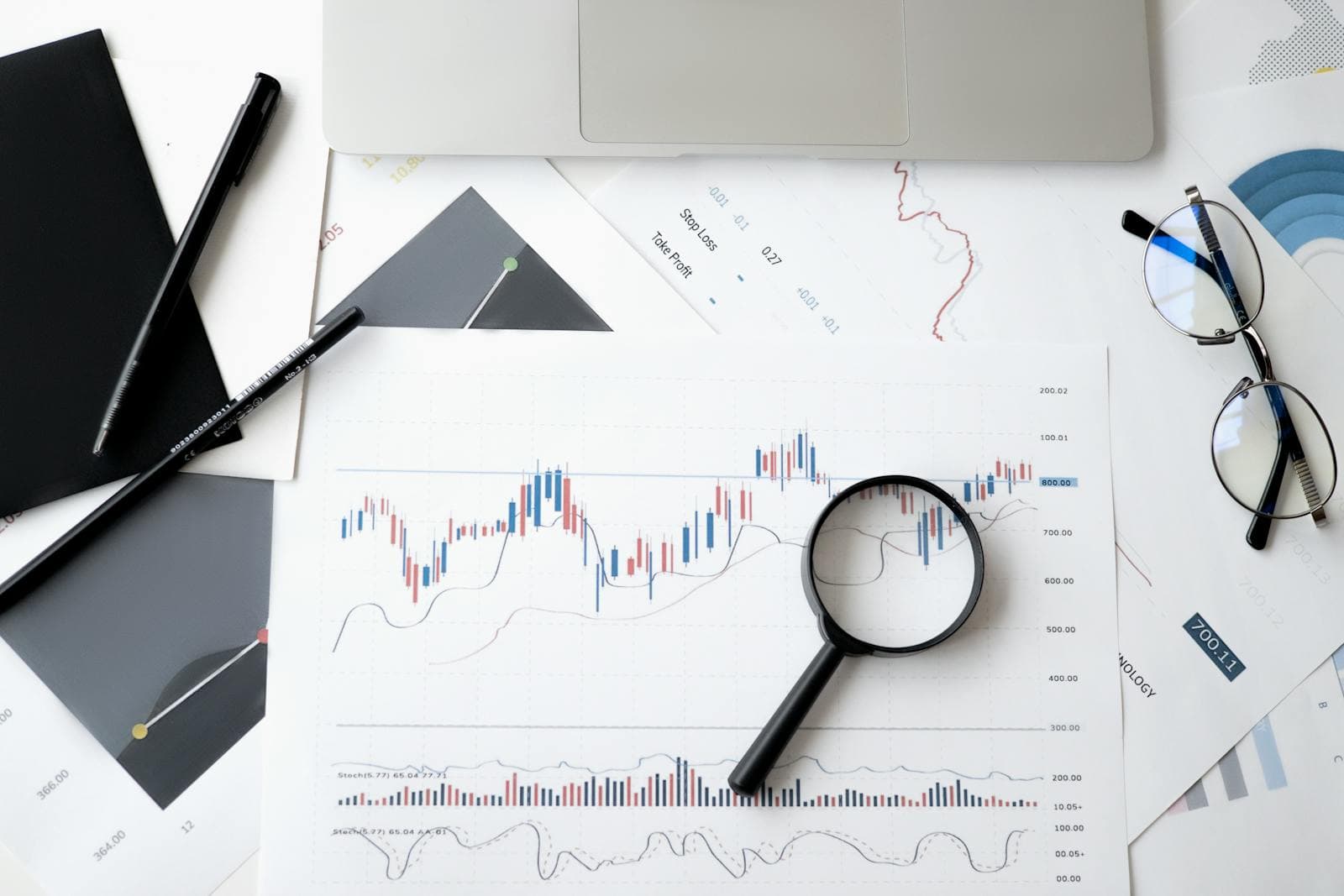 Laptop displaying business growth analytics and performance graphs